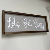 The Giggle Gift Co - Made in the UK Thick Wooden Framed Plaque L63.5cm & Grey Vinyl; Lets Get Cosy