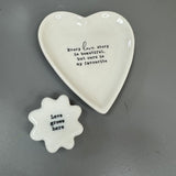 White Ceramic Small 10cm Heart Dish with a quote in black text;
'Every love story is beautiful, but ours is my favourite;