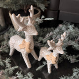 Christmas off white &amp; Neutral Reindeers with a big neutral rough bow&nbsp;
Available in two sizes; Small 15.5cm &amp; Large 21cm