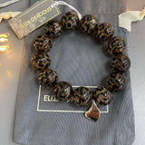 Eliza Gracious - Tiger Eye effect circular Bracelet