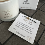 Soy Candle 6.5cm with a Wish-bracelet
Presented in a White Glass Jar with the Fragrance Fresh Cotton
Quote on the Candle Jar -&nbsp; 'You are a Star'