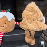 Fabric sitting Christmas pudding with dangly legs