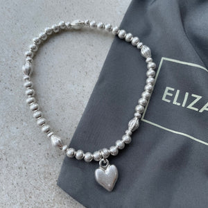 Eliza Gracious quality affordable design led branded costume jewellery   Stretch Ball Bead Bracelet with Heart Charm Available in Matt Silver & Silver
