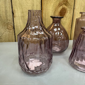 New to the collection - Amethyst Small Glass Bottle Vases
Various styles
Wide ribbed/diamond shape &amp; narrow top H13.8cm&nbsp;
Ribbed wide base &amp; narrow top W7.4 x H9.9cm
Bud Vase H12cm
Tall Slim Ribbed&nbsp; H13.2cm&nbsp;