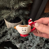 Fun Christmas ceramic Hanging Decoration
Gravy Boat with a smiling face and a santas hat on the handle 7cm