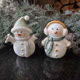 Festive charming small standing 8cm Snowmen with a glistening glitter coating&nbsp;
Available in two styles - Wearing a santa hat &amp; Wearing ear muffs