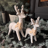 Christmas off white &amp; Neutral Reindeers with a big neutral rough bow&nbsp;
Available in two sizes; Small 15.5cm &amp; Large 21cm
