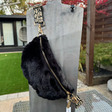 Eliza Gracious - quality affordable design led branded costume jewellery.

Super soft Faux Fur Crossbody bag with a patterned strap
Colour - Black&nbsp;