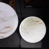Hand crafted unique high quality glass lamps



Glass Pebble Hand-Blown Lamp - Small H18cm
Design - White &amp; Gold glitter shimmer Planet Lamp