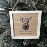 Small wooden hanging pebble sign 13cm with raised textured pebble rudolph with a painted red nose and colourful lights hanging from antlers&nbsp;
Quote - 'Merry Everything and a Happy Always'&nbsp;