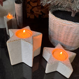 Neutral cream glaze Star shaped t-light holders with a&nbsp; distinctive subtle rustic brown edging along the top&nbsp;
Available in two sizes - Small H4cm &amp; Large H8.5cm