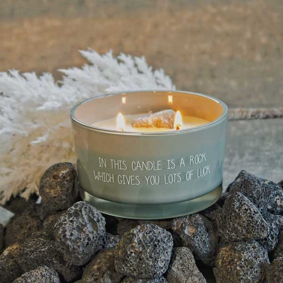 Soy Crystal Candle 10.5cm
Presented in a  Green Glass Jar with the Fragrance Minty Bamboo
Quote on the jar in white text 'In this candle is a rock which gives you lots of luck'
Inside the candle is a Green Aventurine crystal 