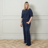 Chalk - Kirsty neat boxy short sleeved Top with cuff detail
Colour - Navy

NEW SS25

Designed in the UK.&nbsp; Designed for Living.