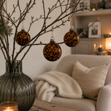 Glass House Interiors - offering unique patterned, quality and shaped glassware.

Glass Bauble: Leopard Print and bronze 9cm