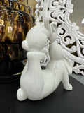 White Ceramic Rabbits kissing