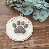 Christmas Wooden Hanging Disc 16cm with a 3D raised Paw print
Quote - I Believe in Santa Paws&nbsp;