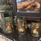 Green Glass Candle Holders featuring embossed Christmas tree around the exterior
Available in 3 sizes - Small 13.5cm, Medium 16.5cm &amp; Large 22cm