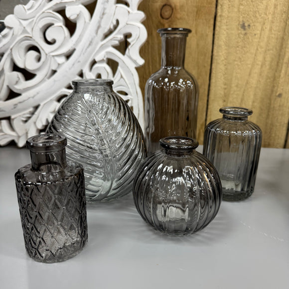 Smokey Grey Small Glass Bottle Vases
Various styles
Leaf pattern H13 x Dia 11cm

Tall Ribbed H19 x Dia 7.5cm
Mini Geometric Bottle H9cm x Dia 5cm
Round Ribbed H8.4 x Dia8.3cm
Small Ribbed H10 x 5cm