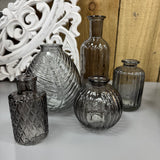 Smokey Grey Small&nbsp;Glass Bottle Vases
Various styles
Leaf pattern H13 x Dia 11cm

Tall Ribbed H19 x Dia 7.5cm
Mini Geometric Bottle H9cm x Dia 5cm
Round Ribbed H8.4 x Dia8.3cm
Small Ribbed H10 x 5cm