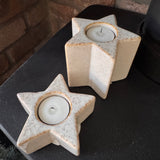 Neutral cream glaze Star shaped t-light holders with a&nbsp; distinctive subtle rustic brown edging along the top&nbsp;
Available in two sizes - Small H4cm &amp; Large H8.5cm