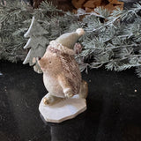 Festive sparkle Hedgehog skating with a tree