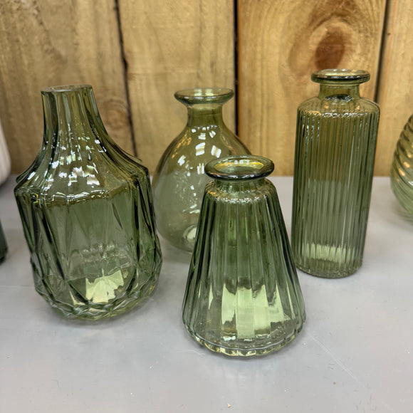 New to the collection; Vintage light Green Small Glass Bottle Vases
Various styles
Wide ribbed/diamond shape & narrow top H13.8cm 
Ribbed wide base & narrow top W7.4 x H9.9cm
Bud Vase H12cm
Tall Slim Ribbed  H13.2cm 