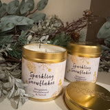 Christmas - Elegance Collection&nbsp;
Tin Candle 50hr burn time - White with images of gold pine cones, snowflake, stars..
Fragrance with white sprinkles of tiny gems &amp; gold glitter for that pretty finishing touch;&nbsp;
Sparkling snowflakes - Fresh aromas of Bergamot, Sandalwood &amp; Neroli