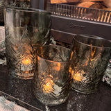 Green Glass Candle Holders featuring embossed Christmas tree around the exterior
Available in 3 sizes - Small 13.5cm, Medium 16.5cm &amp; Large 22cm