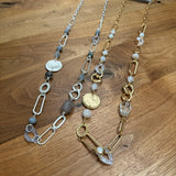 Eliza Gracious quality - affordable design led branded costume jewellery.
Long Necklace with Mixed beaded Necklace&nbsp;
Available in 2 Colours;&nbsp;
Cream with soft pale gold links &amp; with cream &amp; gold beads&nbsp;
Grey with matt silver links &amp; different tones of Grey &amp; silver beads EN0934