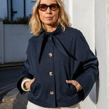 Chalk - Tyla cropped Trench-style Jacket with a tie collar making it a feminine touch..
Colour - Navy