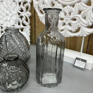 Smokey Grey Small&nbsp;Glass Bottle Vases
Various styles
Leaf pattern H13 x Dia 11cm

Tall Slim Ribbed H22.5 x Dia 10cm

Tall Ribbed H19 x Dia 7.5cm
Mini Geometric Bottle H9cm x Dia 5cm