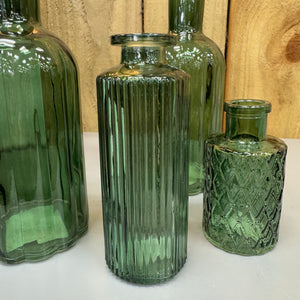 Dark Forest Green Small Glass Bottle Vases
Various styles
Mini Geometric H9.2 x Dia 5cm&nbsp;
Tall slim H13.2 x Dia 5.2cm
Ribbed H10 x D5cm
Tall Ribbed H19 x D8cm&nbsp;
Small Squared patterned Vase H9.2 x D5cm