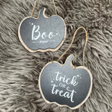 Wooden Black Hanging Pumpkin Plaque 9cm with the quote in white text; "Trick or Treat" 