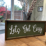 The Giggle Gift Co - Made in the UK Thick Wooden Framed Plaque L63.5cm & Olive Vinyl; Lets Get Cosy