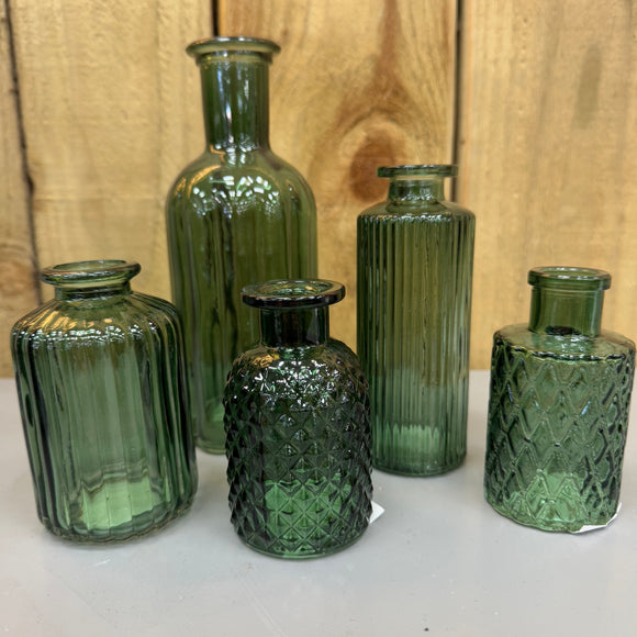 Dark Forest Green Small Glass Bottle Vases
Various styles
Mini Geometric H9.2 x Dia 5cm 
Tall slim H13.2 x Dia 5.2cm
Ribbed H10 x D5cm
Tall Ribbed H19 x D8cm 
Small Squared patterned Vase H9.2 x D5cm