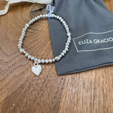 Eliza Gracious - Stretch Ball Bead Bracelet with heart Charm