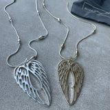 Long snake chain with metal beaded detail with Double Angel Wing Pendant Available in Matt silver & Pale Gold