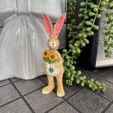Ruth Rabbit holding a bunch of colourful Sunflowers H14cm