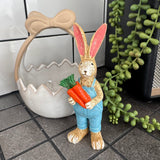Easter - Ruth Rabbit Wearing blue dungarees and holding a bunch of carrots H14cm