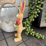 Ruth Rabbit holding bunch of Tulips