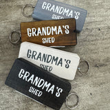 Made in the UK by Giggle Gift Co.
Wooden block keyring with white text quote on both sides;

'Grandma's Shed'&nbsp;