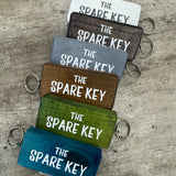 Made in the UK by Giggle Gift Co.
Wooden block keyring with white text quote on both sides;
'The&nbsp;Spare Key'&nbsp;