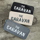 Made in the UK by Giggle Gift Co.
Wooden block keyring with white text quote on both sides;
'The Caravan'&nbsp;
