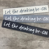 Long L59.5cm Wooden Hanging Plaque;
"Let the drinking be-GIN"

Made in the UK by The Giggle Gift co.