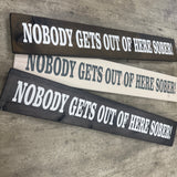 Made in the UK by Giggle Gift Co
Wooden L29.5cm Hanging Quotable Frame;
"Nobody Gets Out of Here Sober!"

*BEST SELLER*