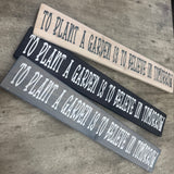 Made in the UK by The Giggle Gift co.
Long Garden L59.5cm Wooden Hanging Plaque;
"To plant a garden is to believe in tomorrow"