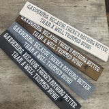 Made in the UK by The Giggle Gift co.
Long Garden L59.5cm Wooden Hanging Plaque;
"Gardening. Because there's nothing better than a well trimmed bush!"