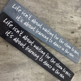 Made in the UK by The Giggle Gift co.
Long&nbsp;L59.5cm Wooden Hanging Plaque;
Quote - "Life isn't about waiting for the storm to pass, it's about learning to dance in the rain."