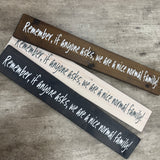 Made in the UK by The Giggle Gift co.
Long L59.5cm Wooden Hanging Plaque;
"Remember, if anyone asks, we are a nice normal family!"