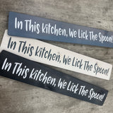 Made in the UK by The Giggle Gift co.
Long&nbsp;L59.5cm Wooden Hanging Plaque;
Quote - "In This Kitchen, We Lick The Spoon!"